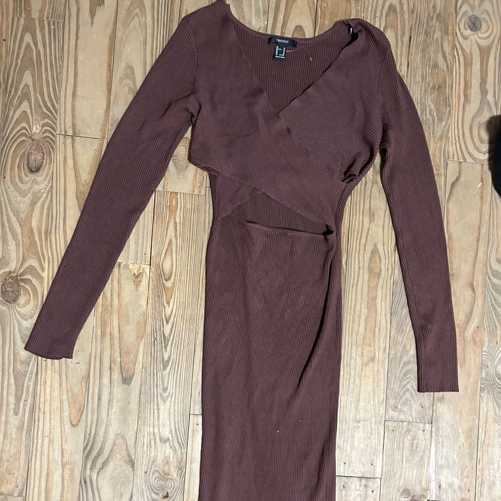 Dark Brown Skin Tight Criss Cross Long Sleeve Full Body Dress in the size M.